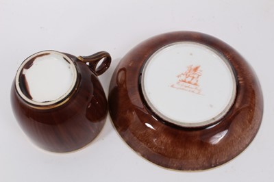 Lot 101 - A Rockingham tortoiseshell glazed teacup, saucer and a bowl, circa 1840