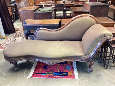 Lot 1280 - Victorian mahogany framed chaise longue, with scroll and leaf carved walnut show wood frame raised on cabriole legs and castors