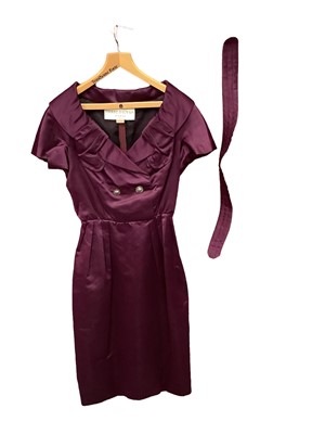 Lot 2050 - Designer Pierre Balmain dress in dark plum satin with crossover bodice, two button fastening, wide collar, fitted waist, belt, shaped skirt. c1980's.