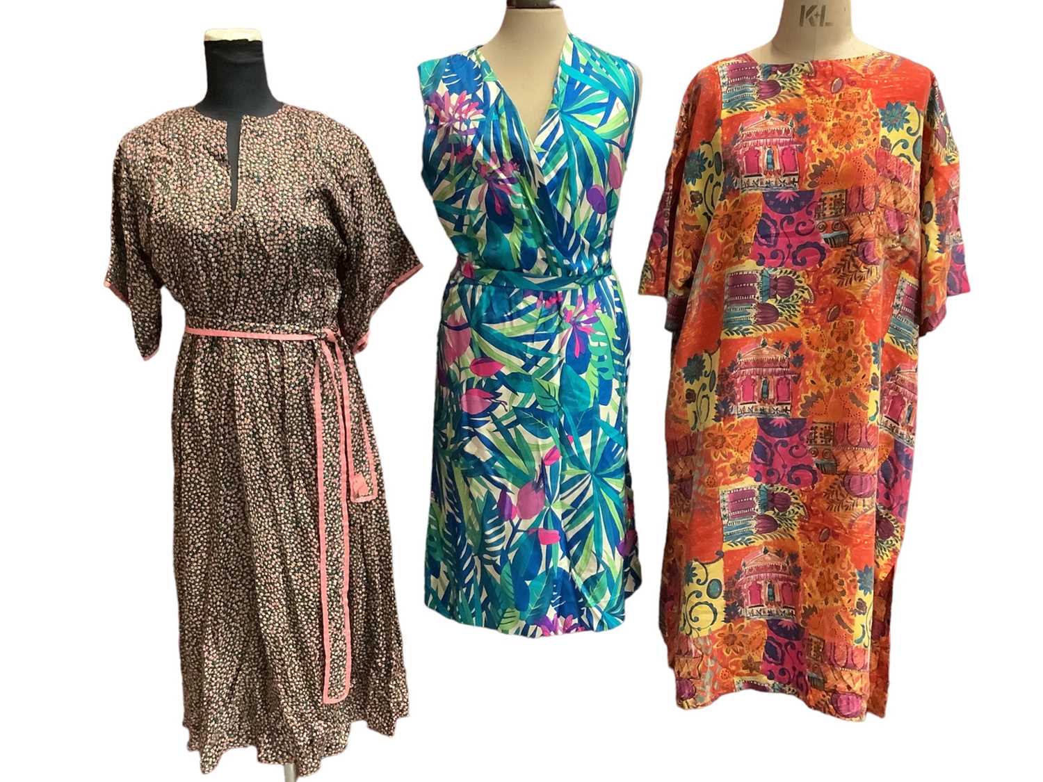 Lot 2053 - Selection of ladies 1970s/80s colourful silk and other clothing, makes include Sarah Spencer and Jaeger. Plus a navy blue satin strapless column evening dress.