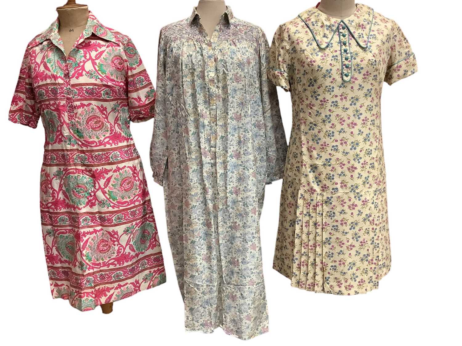 Lot 2055 - Designer Susan Small 1960s floral print dress, 1970s Jaeger floral dress with shoulder smocking, similar period Jaeger black  skirt and blouse with rick rack braiding, Miss Feraud gathered seersu...