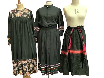 Lot 2055 - Designer Susan Small 1960s floral print dress, 1970s Jaeger floral dress with shoulder smocking, similar period Jaeger black  skirt and blouse with rick rack braiding, Miss Feraud gathered seersu...
