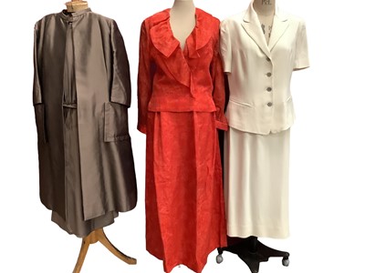 Lot 2056 - Austin Reid cream skirt suit size 12, Kay Scanlon black and red skirt suit, red chiffon evening skirt and blouse, brown dress and matching coat by Miss Mansell designed, Louis Feraud yellow raw sil...
