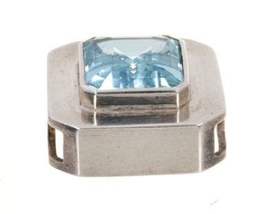 Lot 461 - Large aquamarine pendant with a rectangular step cut aquamarine measuring approximately 19.5mm x 17mm in heavy rectangular silver setting, 34mm x 31mm.