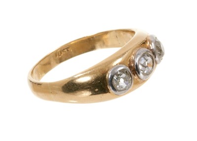 Lot 443 - Diamond three stone gypsy ring with three old cut diamonds in rub-over setting on 18ct gold shank, estimated total diamond weight approximately 0.75cts, ring size U.