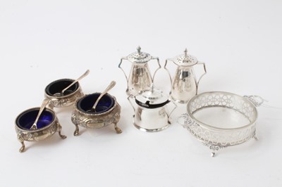 Lot 290 - Edwardian silver three piece condiment set, three Victorian silver salts on pad feet with blue glass liners with spoons and silver butter dish with glass liner (7)
