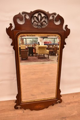 Lot 1402 - George II style walnut fret carved wall mirror