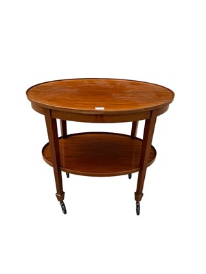 Lot 76 - Early 20th century mahogany oval two tier trolley