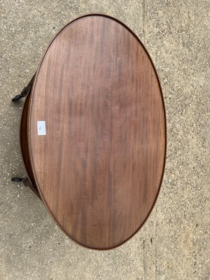 Lot 76 - Early 20th century mahogany oval two tier trolley