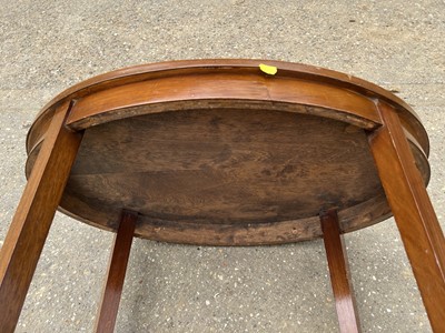 Lot 76 - Early 20th century mahogany oval two tier trolley