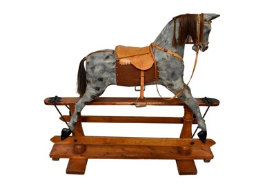 Lot 1431 - Early 20th century painted pine rocking horse
