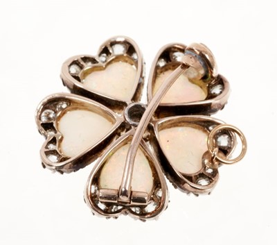 Lot 476 - Late Victorian opal and diamond flower brooch in the form of a pansy, with five heart shaped opal petals and old cut diamonds in silver and gold setting, 24mm.