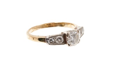 Lot 480 - Art Deco diamond ring with a brilliant cut diamond estimated to weigh approximately 0.60cts flanked by four further diamonds to the platinum shoulders on 28ct gold shank, ring size L.