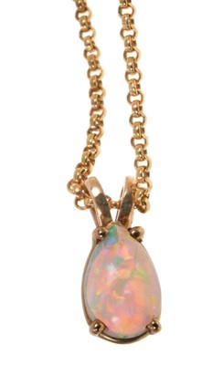 Lot 486 - Opal pendant with a pear shape cabochon opal measuring approximately 9.2mm x 6.1mm in 9ct gold setting on 9ct gold chain.