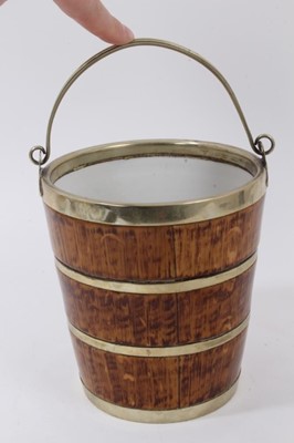 Lot 125 - Late 19th/early 20th century Sitzendorf porcelain ice bucket with simulated wood painted decoration and applied silver plated bands, 15.5cm in height.