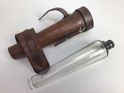 Lot 922 - James Dixon & Son glass saddle flask with silver plated mount in original leather case for saddle mounting