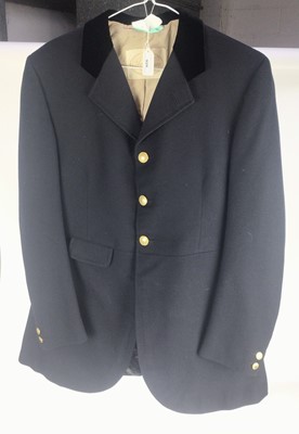Lot 926 - 1950s black hunt coat by Huntsman of Savile Row, with brass buttons, dated to label 11.5.56 and named to a Miss P Ten Bos