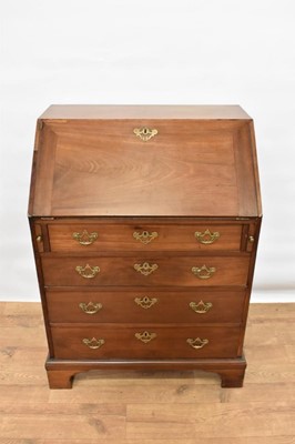 Lot 1468 - Mid 18th century walnut bureau of small size, with hinged fall enclosing fitted interior and four graduated drawers below on bracket feet, 72cm wide x 49cm deep x 99cm high
