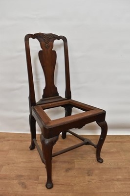 Lot 1481 - George I walnut side chair, with carved solid vase shaped splat and slip in seat (requiring upholstery) on cabriole legs and H-shaped stretcher