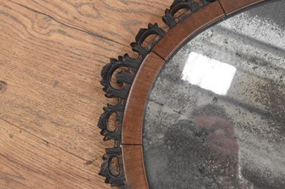 Lot 1488 - Fine 18th century Colonial hardwood wall mirror, with pleasantly distressed oval plate in cushion frame with ornate pierced surround, 77 x 78cm