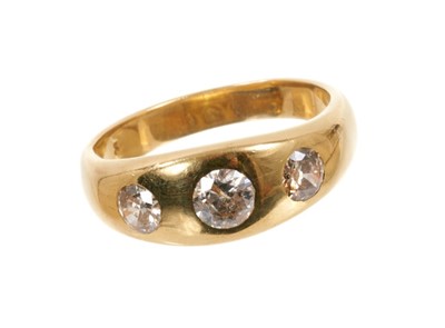Lot 522 - Antique diamond three stone gypsy ring with three old cut diamonds in 18ct gold gypsy setting, estimated total diamond weight approximately 1ct. Birmingham 1937. Ring size W½.