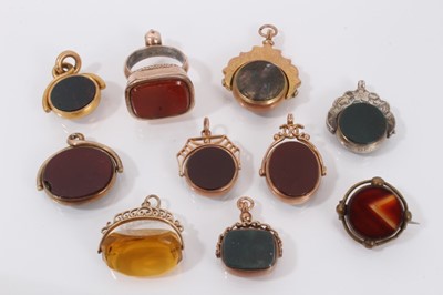 Lot 559 - Collection of ten Victorian and Edwardian seals and fobs to include gold mounted revolving agate fobs (10).