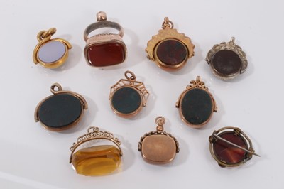 Lot 559 - Collection of ten Victorian and Edwardian seals and fobs to include gold mounted revolving agate fobs (10).