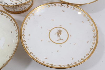 Lot 134 - A Sèvres gilt armorial dessert service, comprising four plates, four footed dishes and a pierced bowl, with printed, impressed and inscribed marks
