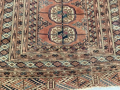 Lot 1507 - Tekke Turkoman rug, with single row of ten quartered medallions in multiple geometric borders, 162 x 85cm, together with another similar, 134 x 119cm