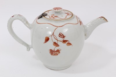 Lot 136 - 18th century Chinese export porcelain teapot, decorated in iron red enamel with a foliate pattern, 23.5cm from spout to handle