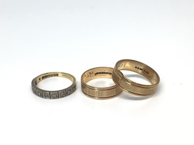 Lot 3 - 18ct gold diamond set half eternity ring and two 9ct gold wedding rings (3)