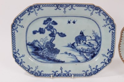 Lot 141 - 18th century Chinese blue and white porcelain platter, painted with the boy on a buffalo pattern, 31.5cm wide, together with an 18th century famille rose dish (2)