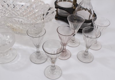 Lot 146 - A group of Regency and later English cut glass, including a pair of decanters in a lacquered stand, a large sweetmeat, a pair of Regency rummers, etc