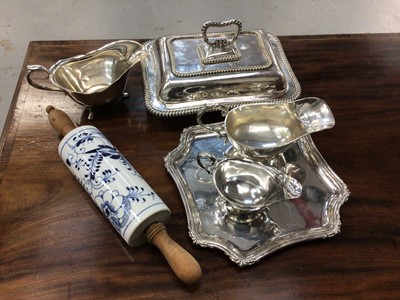Lot 15 - A Meissen-style blue and white onion pattern rolling pin, together with a silver plated entree dish and other silver plate