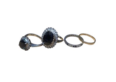 Lot 29 - Sapphire and diamond cluster ring in white gold setting, together with another sapphire and diamond cluster ring