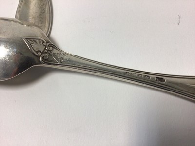 Lot 61 - A set of twelve matching Victorian and Edwardian silver forks and spoons, scrollwork patterns, 18cm long, various hallmarks, 26.4oz total weight