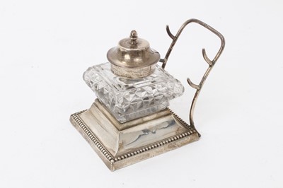 Lot 448 - Edwardian silver and cut glass inkwell with two pen rests