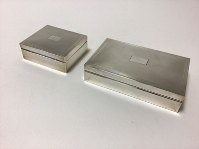 Lot 70 - Two silver cigarette boxes with engine turned decoration and blank cartouches, 14.5cm x 9cm and 9cm x 8cm, London 1963 and 1965