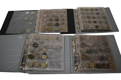 Lot 461 - World - Mixed coinage contained in six coin albums