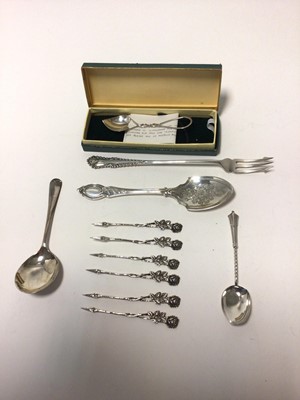 Lot 76 - Scottish silver loving spoon in case, other silver flatware, and a set of six silver cocktail sticks marked 835