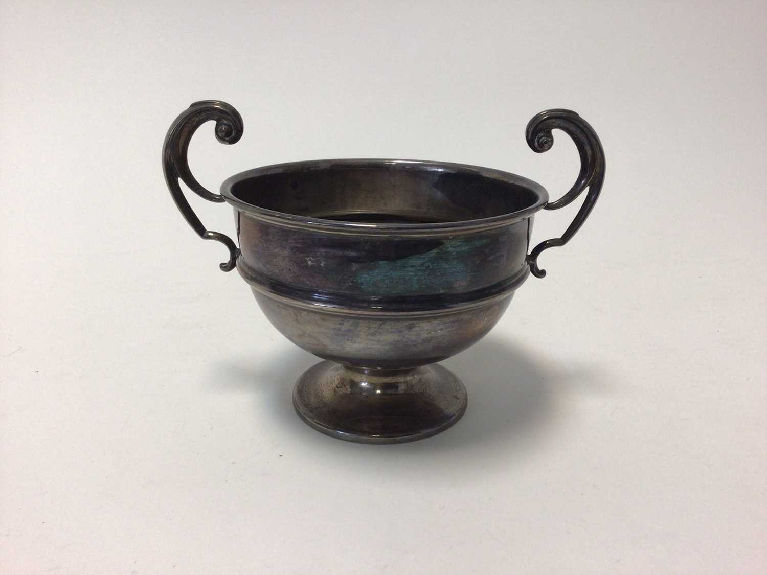 Lot 83 - George V silver twin-handled footed bowl, with banded decoration, 16cm across including handles, Birmingham 1925, 6.3oz