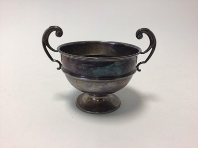 Lot 83 - George V silver twin-handled footed bowl, with banded decoration, 16cm across including handles, Birmingham 1925, 6.3oz