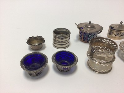 Lot 84 - Group of silver and silver plate, including a toast rack, a pair of pierced dishes on three ball feet, mustard, napkin rings, etc (6.5 oz of silver)