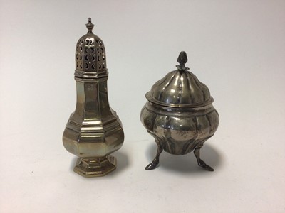 Lot 86 - Sterling silver caster, of octagonal form, Sheffield 1913, 4.1oz, together with a continental silver gourd shaped bowl and cover on three hoof feet, marks to base, 6.5oz