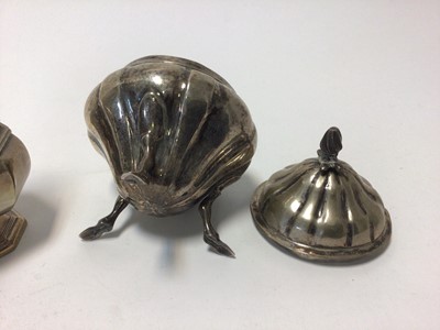 Lot 86 - Sterling silver caster, of octagonal form, Sheffield 1913, 4.1oz, together with a continental silver gourd shaped bowl and cover on three hoof feet, marks to base, 6.5oz