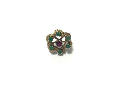 Lot 94 - 18ct gold emerald and ruby flower head ring