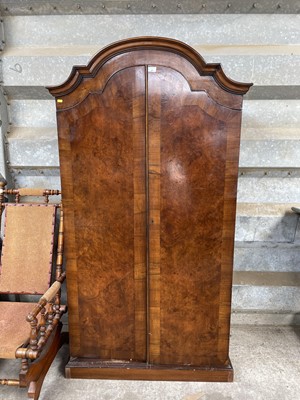 Lot 81 - 1930s walnut dome topped wardrobe on plinth
