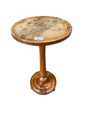 Lot 127 - Good quality oak and elm wine table with turned circular top