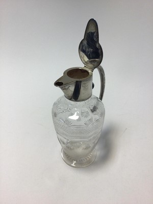 Lot 103 - Edwardian silver mounted cut glass claret jug, with scroll handle, Birmingham 1907, 24cm high