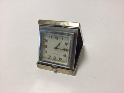 Lot 105 - Silver Art Deco travelling/desk clock, the top enamelled with a scene of three windswept women, with white guilloche surround, Birmingham 1932 (Rotherham & Sons), 8cm x 7cm